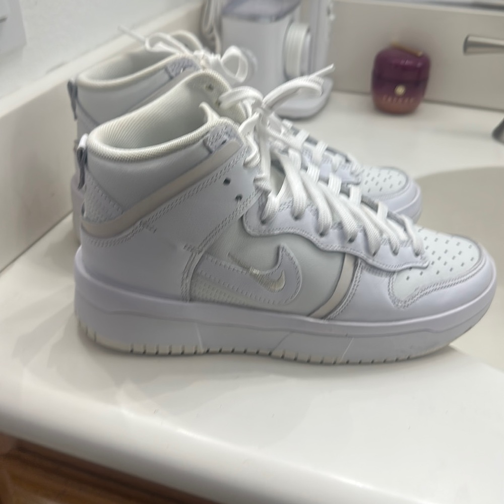 Nike sneakers. Pre-loved.